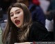 李根娇妻场边观战展笑颜 硬汉背后的温柔力量